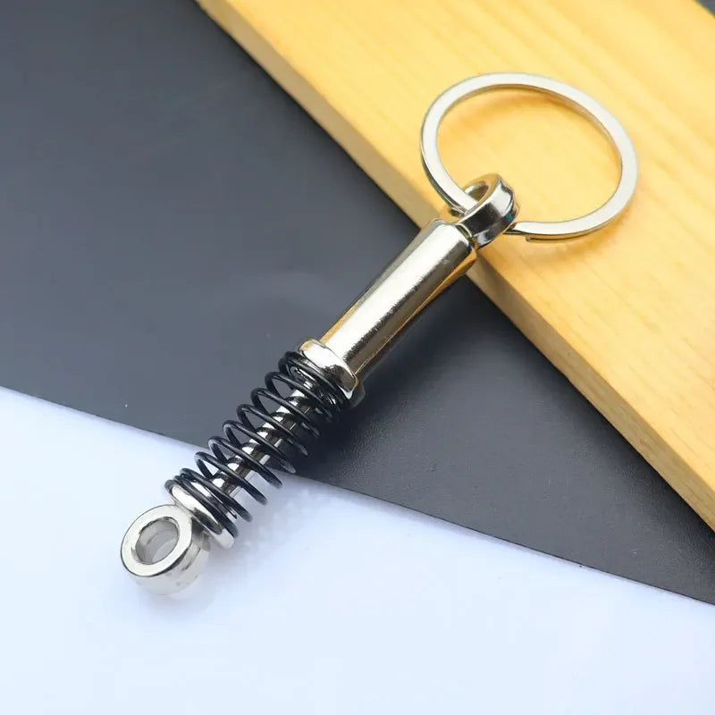 Mini Zinc Alloy Auto Parts Keychains Simulated Speed Gearbox Absorber Motor Piston Pendant Car Keys Holder Keyring Cute Men Gift